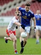 5 January 2020; Conor Madden of Cavan in action against Conal Grimes of Tyrone during the Bank of Ireland Dr McKenna Cup Round 2 match between Tyrone and Cavan at Healy Park in Omagh, Tyrone. Photo by Oliver McVeigh/Sportsfile