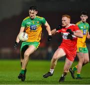 8 January 2020; Michael Langan of Donegal in action against Conor McAtamney of Derry during the Bank of Ireland Dr McKenna Cup Round 3 match between Derry and Donegal at Celtic Park in Derry. Photo by Oliver McVeigh/Sportsfile