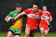 8 January 2020; Conor Morrison of Donegal in action against Ben McCarron of Derry during the Bank of Ireland Dr McKenna Cup Round 3 match between Derry and Donegal at Celtic Park in Derry. Photo by Oliver McVeigh/Sportsfile