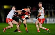 8 January 2020; Rian O'Neill of Armagh in action against Niall Sludden, left, and Frank Burns of Tyrone during the Bank of Ireland Dr McKenna Cup Round 3 match between Armagh and Tyrone at Athletic Grounds in Armagh. Photo by Piaras Ó Mídheach/Sportsfile