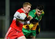 8 January 2020; Christopher Bradley of Derry in action against Caolan McGonagle of Donegal during the Bank of Ireland Dr McKenna Cup Round 3 match between Derry and Donegal at Celtic Park in Derry. Photo by Oliver McVeigh/Sportsfile