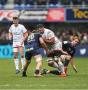 11 January 2020; Marcell Coetzee of Ulster is tackled by Alexandre Fischer during the Heineken Champions Cup Pool 3 Round 5 match between ASM Clermont Auvergne and Ulster at Stade Marcel-Michelin in Clermont-Ferrand, France. Photo by John Dickson/DICKSONDIGITAL