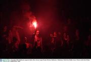 4 November 2003; Shelbourne supporter holds a flare. eircom League Premier Division, Shelbourne v Bohemians, Tolka Park, Dublin. Soccer. Picture credit; David Maher / SPORTSFILE *EDI*