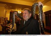 9 October 2003; Ireland baggage master Paddy &quot; Rala &quot; O'Reilly, with a snake from the local reptile park, before a function where the players were presented with their World Cup caps at a Welcome Reception held by the Gosford City Council. 2003 Rugby World Cup, Welcome Reception, Crowne Plaza Hotel, Terrigal, New South Wales, Australia. Picture credit; Brendan Moran / SPORTSFILE *EDI*