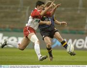 6 December 2003; Brian O'Driscoll, Leinster, in action against Biarritz's Guillaume Bousses. Heineken Cup, Pool 3, Round 1, Leinster Lions v Biarritz Olympique, Lansdowne Road, Dublin. Picture credit; Brendan Moran / SPORTSFILE *EDI*