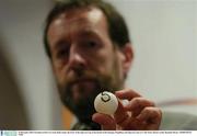 10 December 2003; President of the GAA Sean Kelly makes the draw of the Sigerson Cup at the launch of the Datapac Fitzgibbon and Sigerson Cups at Croke Park. Picture credit; Brendan Moran / SPORTSFILE *EDI*