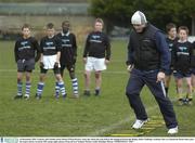 10 December 2003; Leinster and Ireland centre Brian O'Driscoll gives some tips about the step drill at the inaugural Powerade Rugby Skills Challenge Academy Day at Lansdowne Road where gave his expert advice to nearly 200 young rugby players from all over Ireland. Picture credit; Brendan Moran / SPORTSFILE *EDI*