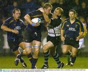 12 December 2003; Eric Miller, Leinster, is tackled by Cardiff's Martin Williams. Heineken Cup, Round 2, Pool 3, Cardiff Blues v Leinster Lions, Cardiff Arms Park, Cardiff, Wales. Picture credit; Matt Browne / SPORTSFILE *EDI*