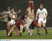 12 December 2003; Neil Best, Ulster, is tackled by the Stade Francais defence. Heineken Cup, Round 2, Pool 1, Ulster v Stade Francais, Ravenhill, Belfast. Picture credit; Damien Eagers / SPORTSFILE *EDI*