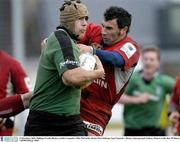 13 December 2003; Phillippe Escalla, Beziers, tackles Connacht's Mike McCarthy. Parker Pen Challenge Cup, Connacht v Beziers, Sportsground, Galway. Picture credit; Ray McManus / SPORTSFILE *EDI*