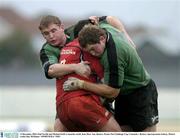 13 December 2003; Paul Neville and Michael Swift, Connacht, tackle Jean Marc Aue, Beziers. Parker Pen Challenge Cup, Connacht v Beziers, Sportsground, Galway. Picture credit; Ray McManus / SPORTSFILE *EDI*