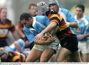 13 December 2003; Dominic Crotty, Garryowen, in action against Lansdowne's Liam Toland. AIB League, Division 1, Lansdowne v Garryowen, Lansdowne Road, Dublin, Ireland. Picture credit; Matt Browne / SPORTSFILE *EDI*