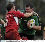 13 December 2003; Connacht captain Tim Allnut is tackled by Pierre Henry Broncan, Beziers. Parker Pen Challenge Cup, Connacht v Beziers, Sportsground, Galway. Picture credit; Ray McManus / SPORTSFILE *EDI*