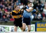 14 December 2003; Ciaran Whelan, Dublin, in action against Underdog's Fergus McAuliffe. TG4 Senior Football Challenge, Dublin v Underdogs, Parnell Park, Dublin. Picture credit; David Maher / SPORTSFILE *EDI*