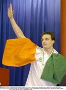 14 December 2003; Ireland's Andrew Bree waves to spectators after receiving the Silver Medal he won in the Men's 200m Breaststroke Final. European Swimming Short Course Championships, National Aquatic Centre, Abbotstown, Dublin, Ireland. Picture credit; Brendan Moran / SPORTSFILE *EDI*