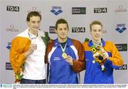 14 December 2003; Ireland's Andrew Bree, left, with the Silver Medal that he won in the Men's 200m Breaststroke Final, alongside Gold Medallist Ian Edmonds, Great Brirtain, and Bronze Medallist Thijs Van Valkengoed, the Netherlands. European Swimming Short Course Championships, National Aquatic Centre, Abbotstown, Dublin, Ireland. Picture credit; Brendan Moran / SPORTSFILE *EDI*