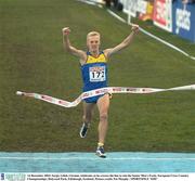 14 December 2003; Sergiy Lebid, Ukraine, celebrates as he crosses the line to win the Senior Men's Event. European Cross Country Championships, Holyrood Park, Edinburgh, Scotland. Picture credit; Pat Murphy / SPORTSFILE *EDI*