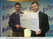 17 December 2003; Club Energise has rewarded the Gaelic Players' Association with a cheque for EUR 50,000 from their hugely successful isotonic sports drink initiative. Pictured at the presentation are Michael McArdle, left, Marketing Director for C&C, who presented the cheque to Dessie Farrell, Chief Executive of the Carphone Warehouse sponsored Gaelic Players' Association. Burlington Hotel, Dublin. Picture credit; David Maher / SPORTSFILE *EDI*