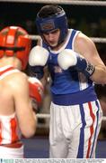 19 December 2003; James Moore, Red, in action against Henry Coyle, Blue. National Senior Championships 2004, Welterweight Final, James Moore, (Arklow) v Henry Coyle, (Geesala), National Stadium, Dublin. Picture credit; Damien Eagers / SPORTSFILE *EDI*