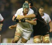 20 December 2003; Rowan Frost, Ulster, is tackled by Scott Murray, Edinburgh. Celtic Cup Final, Edinburgh Rugby v Ulster, Murrayfield, Edinburgh, Scotland. Picture credit; Matt Browne / SPORTSFILE *EDI*