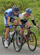 23 June 2013; Philip Deignan, United Healthcare, left, alongside Philip Lavery, Amicale Cycliste Bisontine, during the Elite Men's Road Race National Championships. Carlingford, Co. Louth. Picture credit: Stephen McMahon / SPORTSFILE