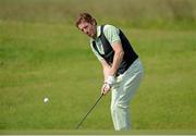 26 June 2013; Jockey Johnny Murtagh pitches onto the 5th green during the Irish Open Golf Championship 2013 Pro Am. Carton House, Maynooth, Co. Kildare. Picture credit: Matt Browne / SPORTSFILE