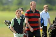 26 June 2013; Jockey Johnny Murtagh, left, with former Munster and Ireland rugby player Mick O'Driscoll on the 5th fairway during the Irish Open Golf Championship 2013 Pro Am. Carton House, Maynooth, Co. Kildare. Picture credit: Matt Browne / SPORTSFILE