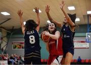 11 January 2020; Kaitlynn Miley of Templeogue in action against Eimile Rogers Duffy, left, and Abigail Rafferty of UU Tigers during the Hula Hoops U20 Women's National Cup Semi-Finall match between Templeogue BC and UU Tigers at Parochial Hall in Cork. Photo by Sam Barnes/Sportsfile