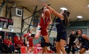 11 January 2020; Hannah Murphy of Templeogue goes for a lay up despite the attentions of Abigail Rafferty of UU Tigers during the Hula Hoops U20 Women's National Cup Semi-Finall match between Templeogue BC and UU Tigers at Parochial Hall in Cork. Photo by Sam Barnes/Sportsfile