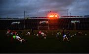 11 January 2020; Cork players warm-up before the floodlights are turned on before the McGrath Cup Final match between Cork and Limerick at LIT Gaelic Grounds in Limerick. Photo by Piaras Ó Mídheach/Sportsfile