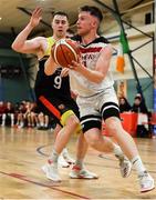 11 January 2020; Jack O’Mahony of Fr Mathews  in action against Kevin Donohoe of IT Carlow during the Hula Hoops Men's Presidents National Cup Semi-Final match between IT Carlow Basketball and Fr Mathews at Parochial Hall in Cork. Photo by Sam Barnes/Sportsfile