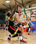11 January 2020; Jack O’Mahony of Fr Mathews  in action against Duane Harper of IT Carlow during the Hula Hoops Men's Presidents National Cup Semi-Final match between IT Carlow Basketball and Fr Mathews at Parochial Hall in Cork. Photo by Sam Barnes/Sportsfile
