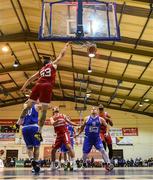 11 January 2020; Lorcan Murphy of Griffith College Templeogue dunks the ball over Roy Downey of Coughlan C&S Neptune during the Hula Hoops Men's Pat Duffy National Cup Semi-Final match between Griffith College Templeogue and Coughlan C&S Neptune at Neptune Stadium in Cork. Photo by Brendan Moran/Sportsfile