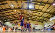 11 January 2020; Lorcan Murphy of Griffith College Templeogue dunks the ball over Roy Downey of Coughlan C&S Neptune during the Hula Hoops Men's Pat Duffy National Cup Semi-Final match between Griffith College Templeogue and Coughlan C&S Neptune at Neptune Stadium in Cork. Photo by Brendan Moran/Sportsfile