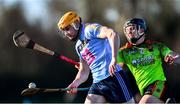 12 January 2020; Diarmuid O'Flionn of UCD in action against Niall Brassil of IT Carlow during the Fitzgibbon Cup Round 1 match between UCD and IT Carlow at UCD Billings Park in Belfield, Dublin. Photo by Ben McShane/Sportsfile