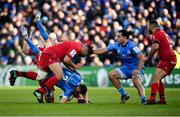 12 January 2020; Garry Ringrose of Leinster is tackled by Hamza Kaabèche, left, and Francisco Gomez Kodela of Lyon during the Heineken Champions Cup Pool 1 Round 5 match between Leinster and Lyon at the RDS Arena in Dublin. Photo by David Fitzgerald/Sportsfile