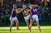 12 January 2020; Paddy Deegan of Kilkenny in action against Micheál Dwyer, left, and Billy Ryan of Kilkenny during the Walsh Cup Semi-Final match between Kilkenny and Wexford at John Lockes GAA Club, John Locke Park in Callan, Kilkenny. Photo by Ray McManus/Sportsfile