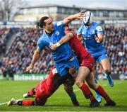 12 January 2020; James Lowe of Leinster is tackled by Noa Nakaitaci, left, and Xavier Mignot of Lyon during the Heineken Champions Cup Pool 1 Round 5 match between Leinster and Lyon at the RDS Arena in Dublin. Photo by Ramsey Cardy/Sportsfile