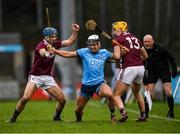 12 January 2020; Cian Boland of Dublin in action against Johnny Coen, left, and Sean Bleahane of Galway during the Walsh Cup Semi-Final match between Dublin and Galway at Parnell Park in Dublin. Photo by Harry Murphy/Sportsfile