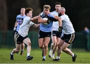 12 January 2020; Fiachra Clifford of UCD in action against Dailaigh Jones, left, and Barry Dan O'Sullivan of UCD during the Sigerson Cup Round 1 between UCD and UU Jordanstown at UCD Billings Park in Belfield, Dublin. Photo by Ben McShane/Sportsfile