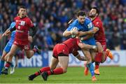 12 January 2020; Robbie Henshaw of Leinster in action against Xavier Mignot, left, and Jonathan Pélissié of Lyon during the Heineken Champions Cup Pool 1 Round 5 match between Leinster and Lyon at the RDS Arena in Dublin. Photo by Ramsey Cardy/Sportsfile