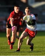 12 January 2020; Ben O'Donnell of Tyrone in action against Daniel Guinness of Down during the Bank of Ireland Dr McKenna Cup Semi-Final match between Tyrone and Down at the Athletic Grounds in Armagh. Photo by Oliver McVeigh/Sportsfile
