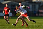 12 January 2020; Ben O'Donnell of Tyrone in action against Daniel Guinness of Down during the Bank of Ireland Dr McKenna Cup Semi-Final match between Tyrone and Down at the Athletic Grounds in Armagh. Photo by Oliver McVeigh/Sportsfile