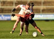 12 January 2020; Frank Burns of Tyrone in action against Barry O'Hagan of Down during the Bank of Ireland Dr McKenna Cup Semi-Final match between Tyrone and Down at the Athletic Grounds in Armagh. Photo by Oliver McVeigh/Sportsfile