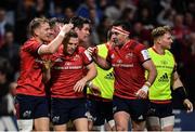 12 January 2020; Andrew Conway of Munster, centre, is congratulated by team-mates Mike Haley, left, and Niall Scannell, after scoring his side's first try during the Heineken Champions Cup Pool 4 Round 5 match between Racing 92 and Munster at Paris La Defence Arena in Paris, France. Photo by Seb Daly/Sportsfile