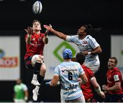 12 January 2020; Mike Haley of Munster and Teddy Thomas of Racing 92 contest a high ball during the Heineken Champions Cup Pool 4 Round 5 match between Racing 92 and Munster at Paris La Defence Arena in Paris, France. Photo by Seb Daly/Sportsfile