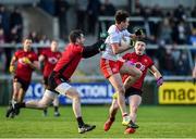 12 January 2020; Conall McCann of Tyrone in action against Kevin McKernan and Daniel Guinness of Down during the Bank of Ireland Dr McKenna Cup Semi-Final match between Tyrone and Down at the Athletic Grounds in Armagh. Photo by Oliver McVeigh/Sportsfile