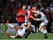 12 January 2020; Jack O’Donoghue of Munster is tackled by Virimi Vakatawa, left, and Teddy Iribaren of Racing 92 during the Heineken Champions Cup Pool 4 Round 5 match between Racing 92 and Munster at Paris La Defence Arena in Paris, France. Photo by Seb Daly/Sportsfile