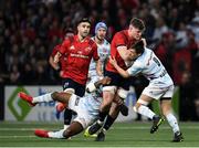 12 January 2020; Jack O’Donoghue of Munster is tackled by Virimi Vakatawa, left, and Teddy Iribaren of Racing 92 during the Heineken Champions Cup Pool 4 Round 5 match between Racing 92 and Munster at Paris La Defence Arena in Paris, France. Photo by Seb Daly/Sportsfile
