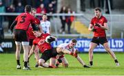 12 January 2020; Conor Poland of Down in action against Conall Grimes of Tyrone during the Bank of Ireland Dr McKenna Cup Semi-Final match between Tyrone and Down at the Athletic Grounds in Armagh. Photo by Oliver McVeigh/Sportsfile